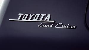 Logo Toyota Land Cruiser Heritage en cursiva